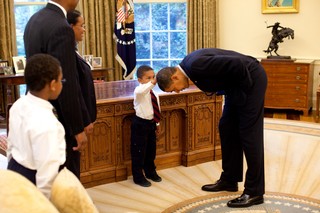 President Obama heads up to the residence after the White House inauguration party in 2009
